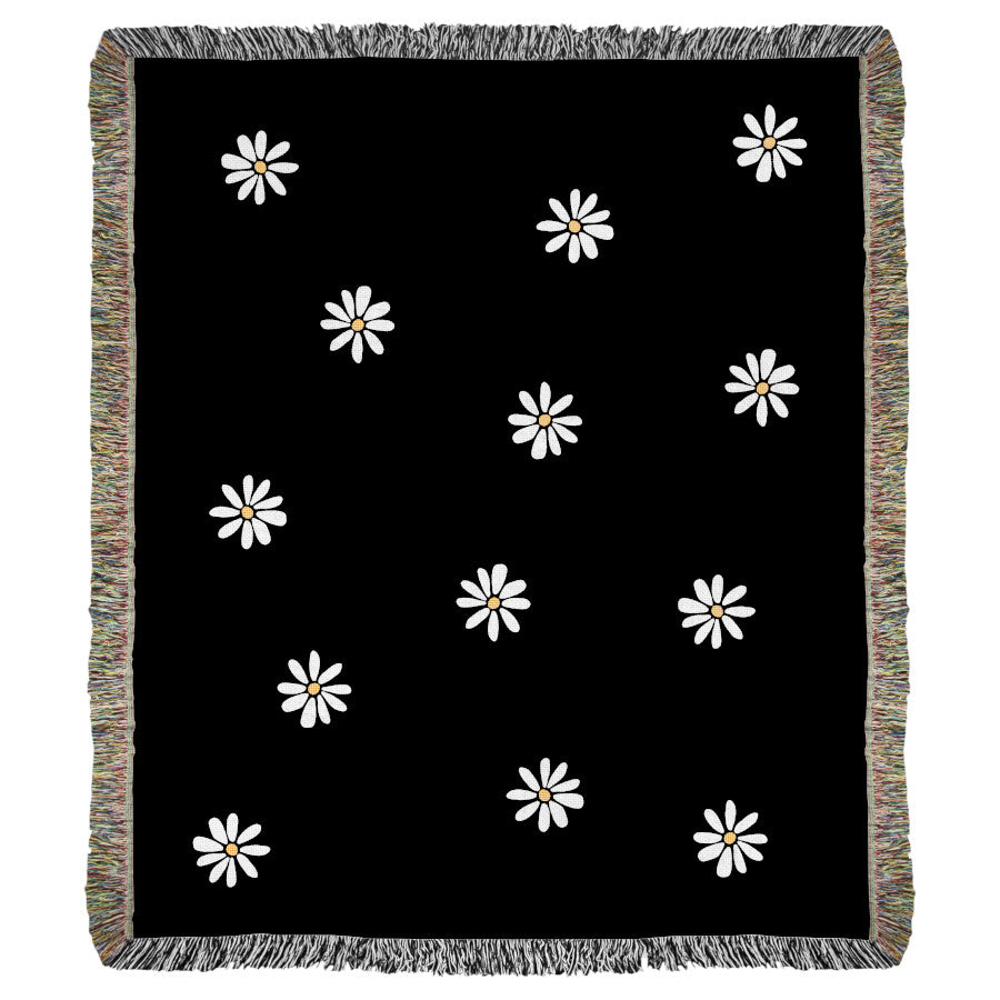 Product image of black with white flowers woven throw blanket titled Superbloom.