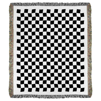 Product image of black and white checkered woven throw blanket titled Torrey Checkered.